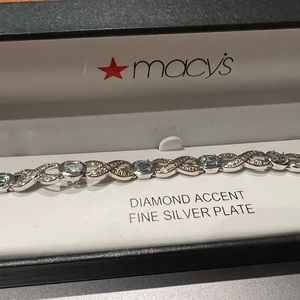 Silver Blue Topaz Infinity Bracelet